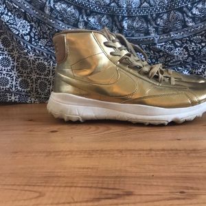 Gold nike shoes